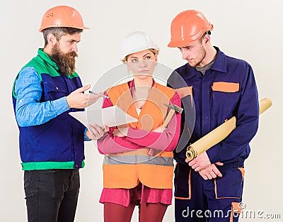 Inspector chastises employee, builder. Insubordination concept. Builder, engineer, architect, Stock Photo