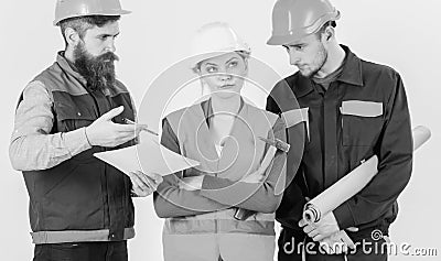Inspector chastises employee, builder. Insubordination concept. Men and woman Stock Photo