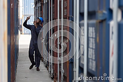 Inspector Inspecting the Containers at the Port Stock Photo