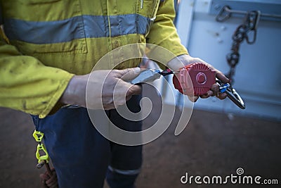 Fall arrest self retracting absorber safety device equipment Stock Photo