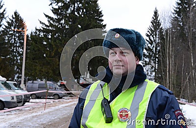 The inspector of traffic police on winter road Editorial Stock Photo