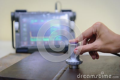 Inspector use ultrasonic testing machine for inspection defect i Stock Photo