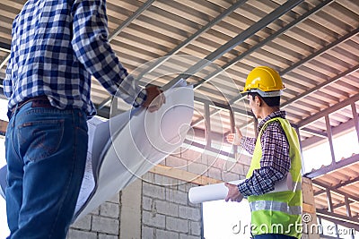 Inspectors check the completeness of the construction of the house. Discuss methods and solve building structure problems with Stock Photo