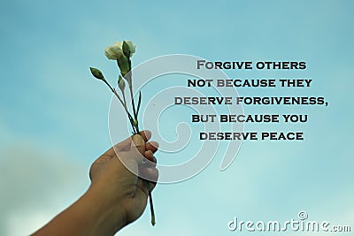 Inspiraitonal motivational quote-Forgive others not because they deserve forgiveness, but because you deserve peace. Stock Photo