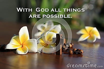 Inspiratinal quote - With God all things are possible. With rosary beads and flowers. Beleive in God concept. Stock Photo