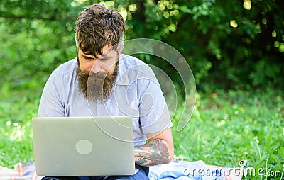 Inspiration for blogging. Looking for inspiration. Blogger becoming inspired by nature. Man bearded with laptop sit Stock Photo