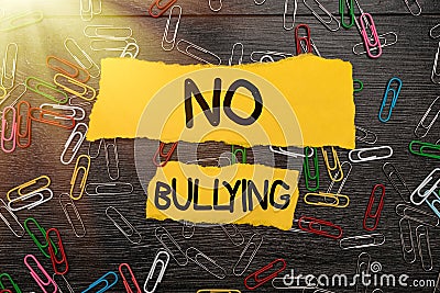 Conceptual caption No Bullying. Internet Concept stop aggressive behavior among children power imbalance Bright New Stock Photo