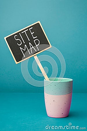 Hand writing sign Site Map. Business overview designed to help both users and search engines navigate the site Stock Photo