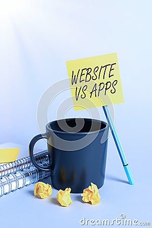 Hand writing sign Website Vs Apps. Internet Concept Doubt between using a webpage or an online application Frame Stock Photo