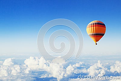 Inspiration or travel background, fly, colorful hot air balloon in blue sky Stock Photo