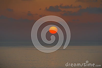 Inspirational calm sea with sunset sky. Meditation ocean and sky background. Colorful horizon over the water. Stock Photo