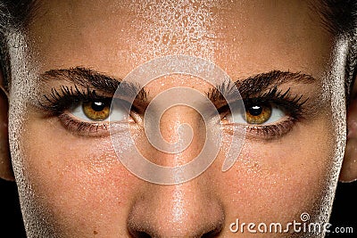 Inspirational close up of determined and passionate athlete, confident powerful eyes staring intense with conviction during workou Stock Photo