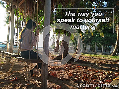 Inspirational motivational quote - The way you speak to yourself matters. With young girl alone on a swing with warm sunlight Stock Photo