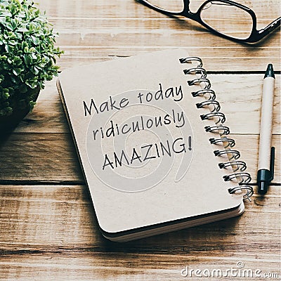 Inspirational quotes on a notepad - Make today ridiculously amazing. Blurry retro style background Stock Photo