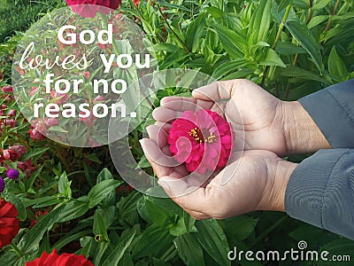 Inspirational quote - God loves you for no reason. With person holding a red flower. Spirituality believe in God concept Stock Photo