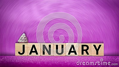 inspirational time concept - word January on wooden blocks in purple vintage background Stock Photo