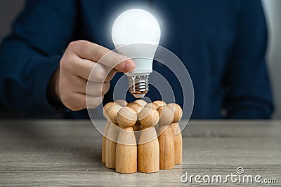 Inspire the team to work successfully. Leader accumulates ideas and experience to make a solution. Stock Photo