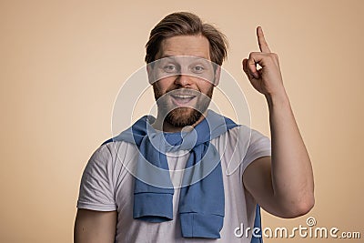 Inspired caucasian man having good idea, startup plan, showing inspiration motivation Eureka gesture Stock Photo