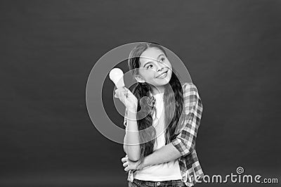 Inspired child red background. Inspiration and brainstorming. Fresh ideas. Electricity and energy. Little girl hold Stock Photo