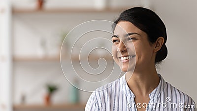 Inspired excited indian female enjoy life dream of positive things Stock Photo
