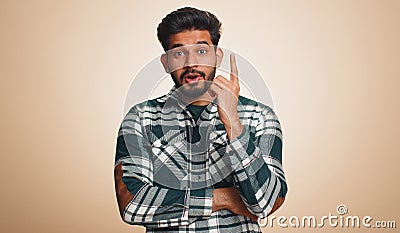 Inspired indian man having good idea, plan, startup, showing inspiration motivation Eureka gesture Stock Photo