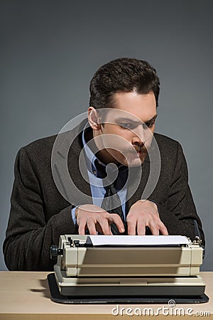 Inspired young author typing Stock Photo