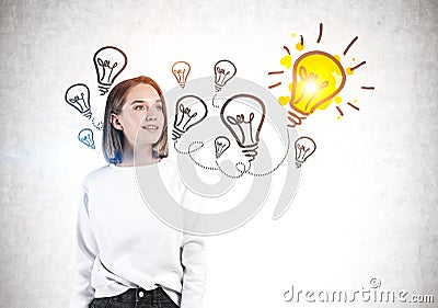 Inspired young woman and her bright idea Stock Photo