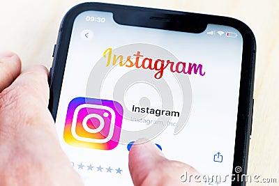Instagram app on Iphone screen. Editorial Stock Photo
