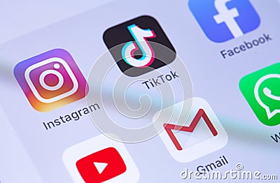 Instagram, TikTok icon and popular mobile apps on the screen smartphone closeup. Editorial Stock Photo