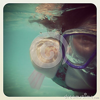 Instagram of young girl snorkelling Stock Photo