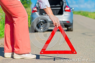 Install an emergency stop sign on the pavement Stock Photo