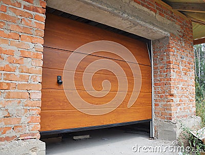 Install New House Garage Door. Garage Door Installation. Stock Photo