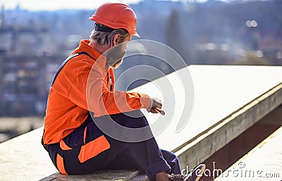 Install partially overlapping layers of material over roof insulation surfaces. Master repair roof. Flat roof Stock Photo