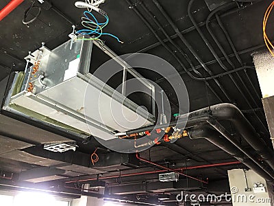 Installation of Air handing unit in loft office Stock Photo