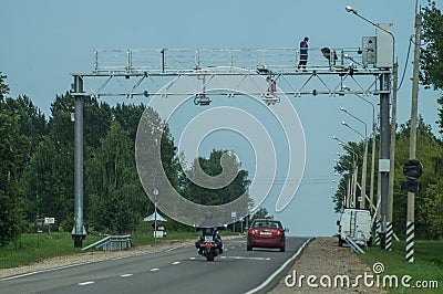 The installation of cameras of video fixing of violations on the highway in the Kaluga region of Russia. Editorial Stock Photo