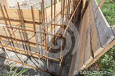 Installation of formwork during the construction of a strip, shallow foundation, close-up Stock Photo