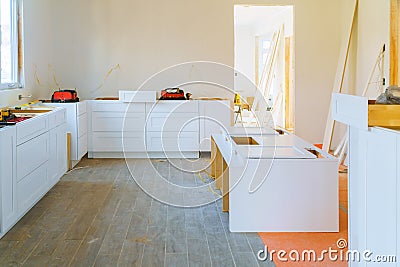 Installation modern kitchen cabinet of furniture details Stock Photo