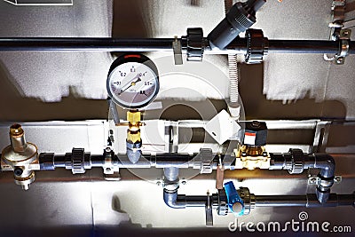 Installation of plastic pipes for water pipelines and manometer Stock Photo