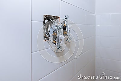 Installation of electrical switch sockets in the bathroom Stock Photo