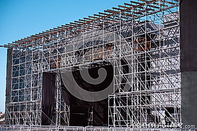 Installation of professional concert equipment. Lifting of line array speakers Stock Photo