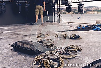 Installation of professional sound, light, video and stage equipment for a concert. Stock Photo