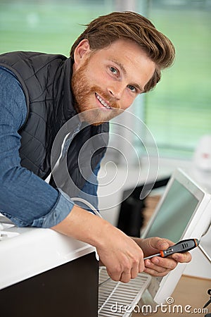 installation service fix repair maintenance air conditioner Stock Photo