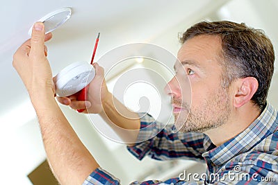 Installation smoke alarm Stock Photo