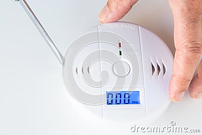 Installation of a smoke and fire alarm with carbon monoxide sens Stock Photo