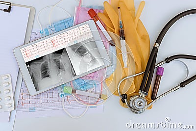 After installed pacemakers, X-ray chest and electrocadiogram of wave report in digital the tablet view Stock Photo