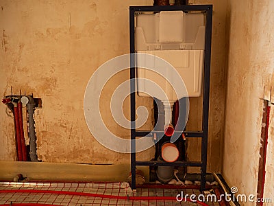 installing concealed toilet frame in bathroom Stock Photo