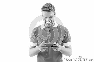 Installing game. Exciting gaming. Mobile repair. Happy handsome man hold cell phone. 5G fast connection. Mobile Stock Photo