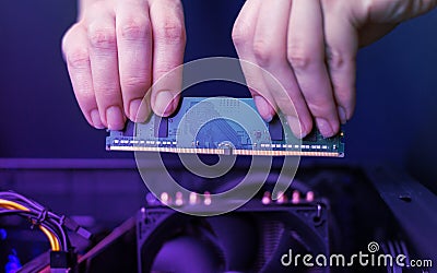 Installing a memory module in your computer. A simple module for a personal computer Stock Photo