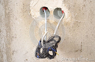 Installing power outlets. Power sockets on initial stage of construction Stock Photo