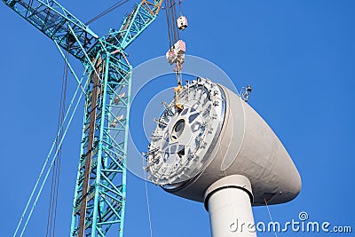 Installing rotor house at the top of a new Dutch wind turbine Stock Photo